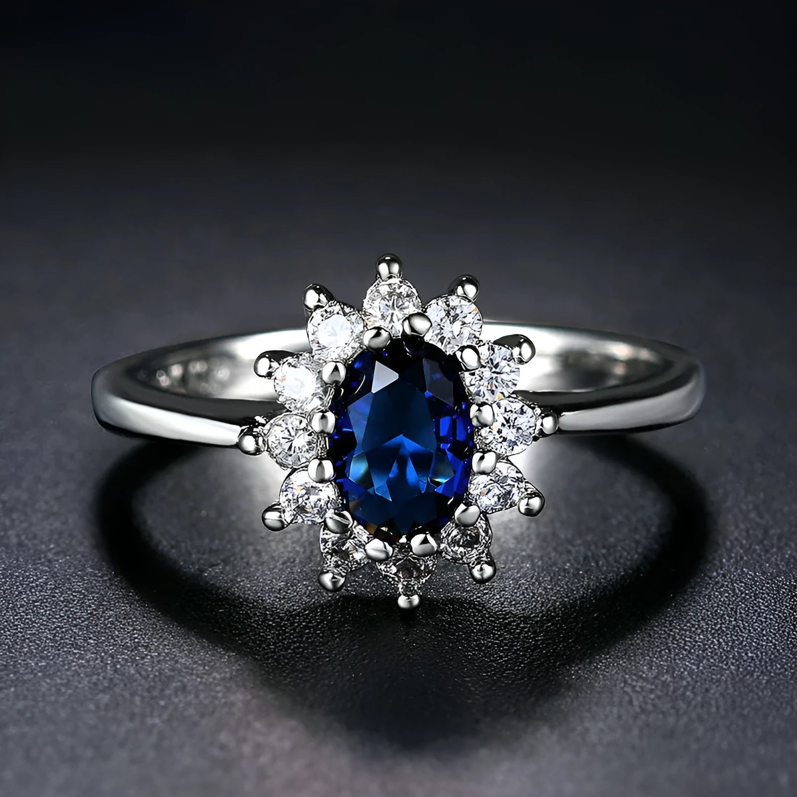 Women's copper flower ring with moissanite centre, shown in green, sapphire blue, and pomegranate red colour options.