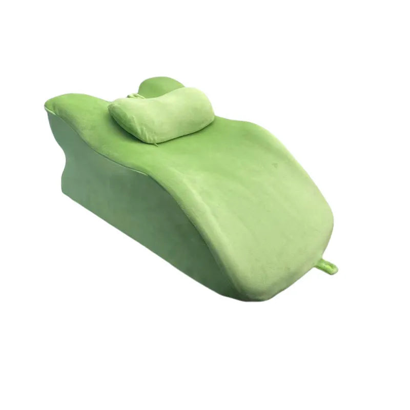 Cushion for stomach sleepers in blue, dark grey, green and light grey colours