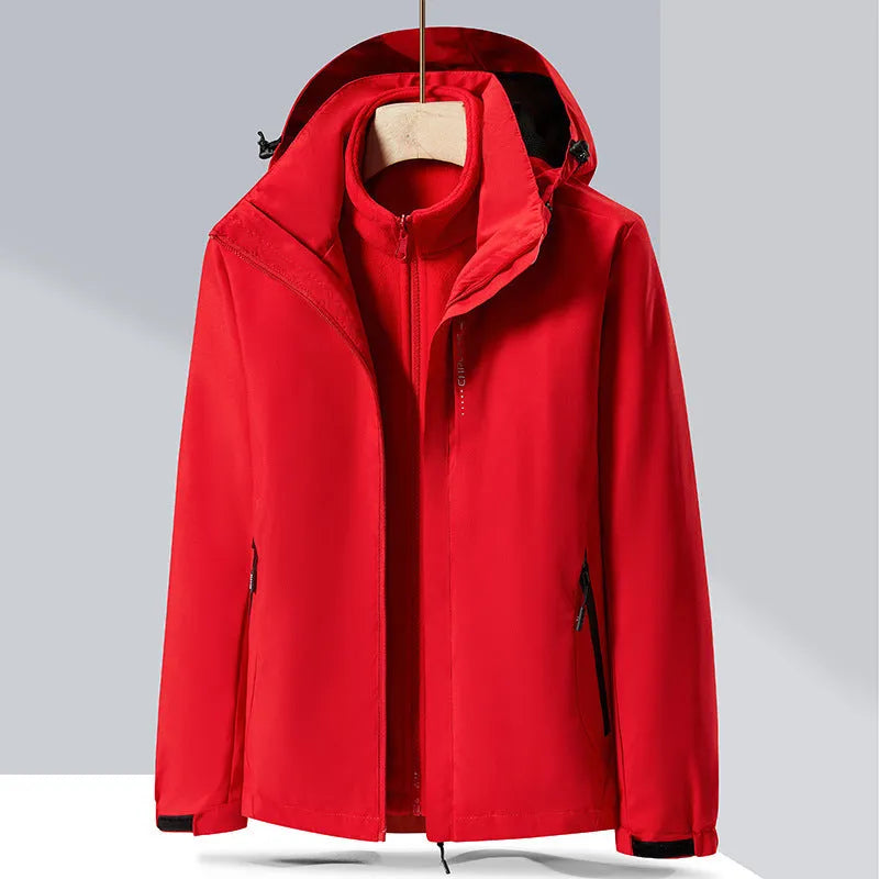 Men's black waterproof mountaineering jacket and trousers set with removable fleece lining.