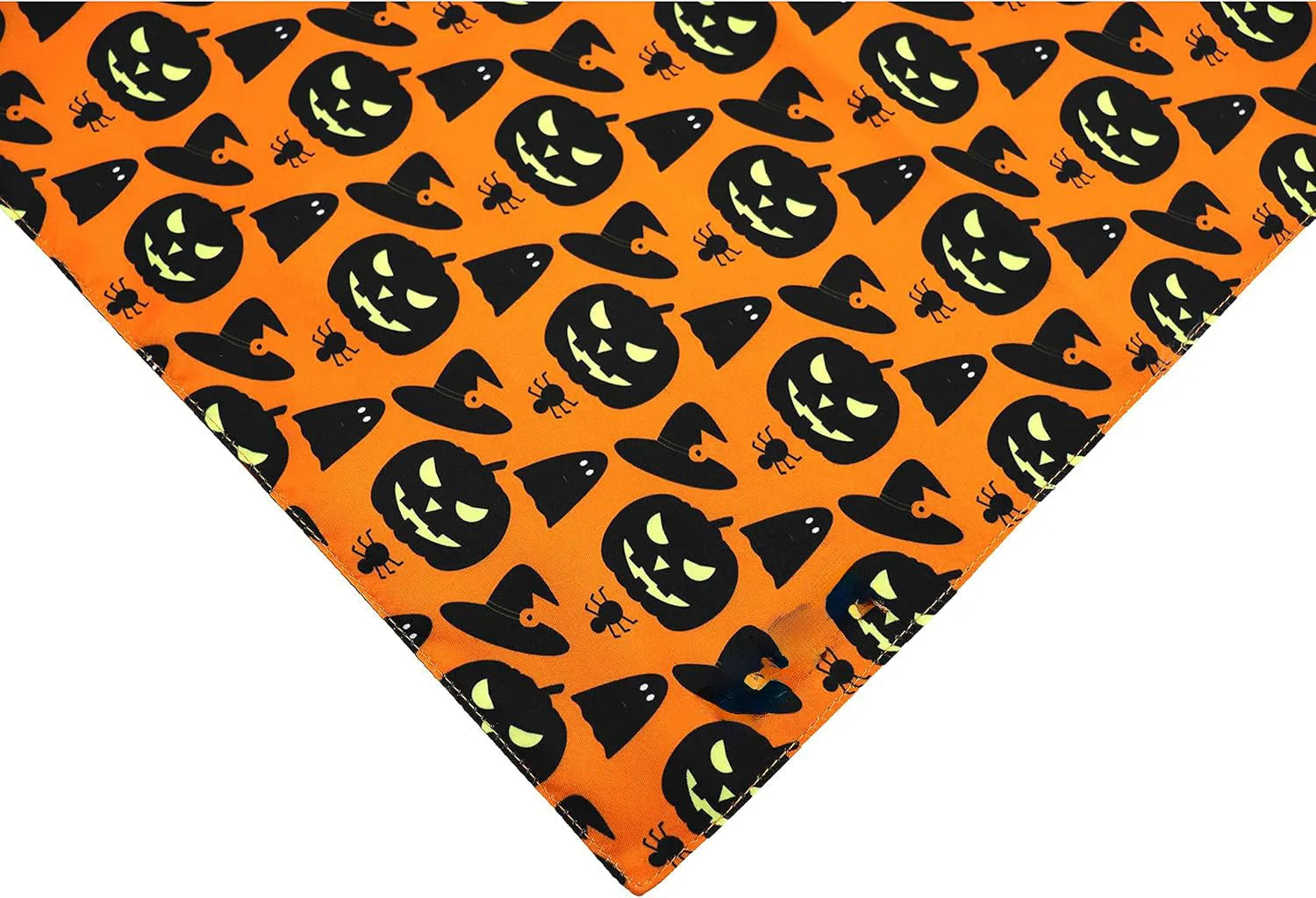 Black and orange reversible Halloween dog bandana with pumpkin and spider web patterns showing adjustable closure