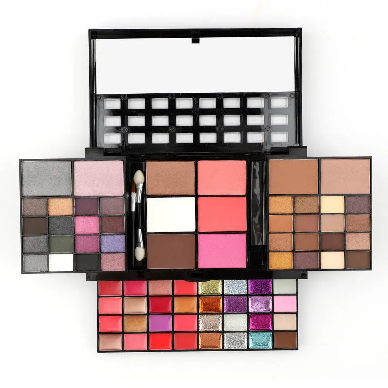 74-colour makeup palette open showing eyeshadows, lip glosses, and face powders with included brushes