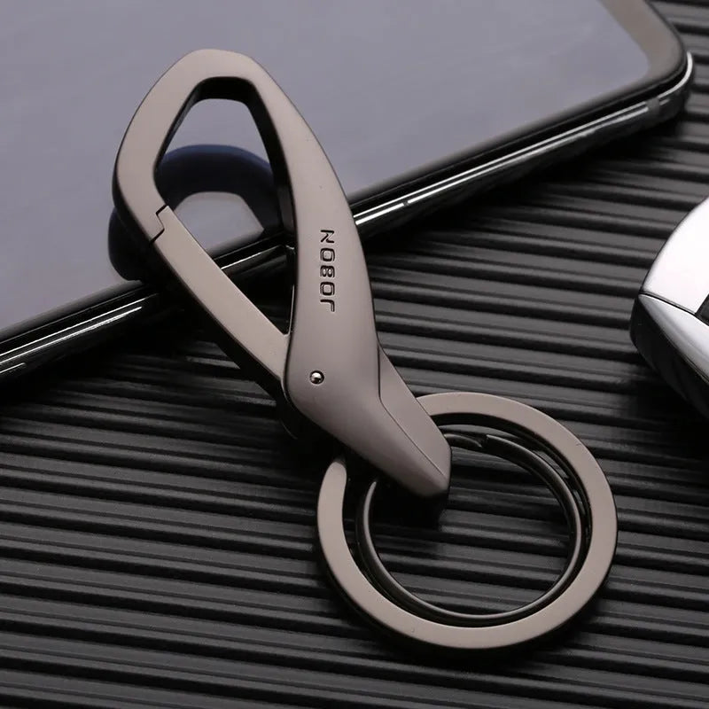 Zinc alloy car key chain with double rings, measuring 8.3x3.5cm in black, chrome, and nickel colours