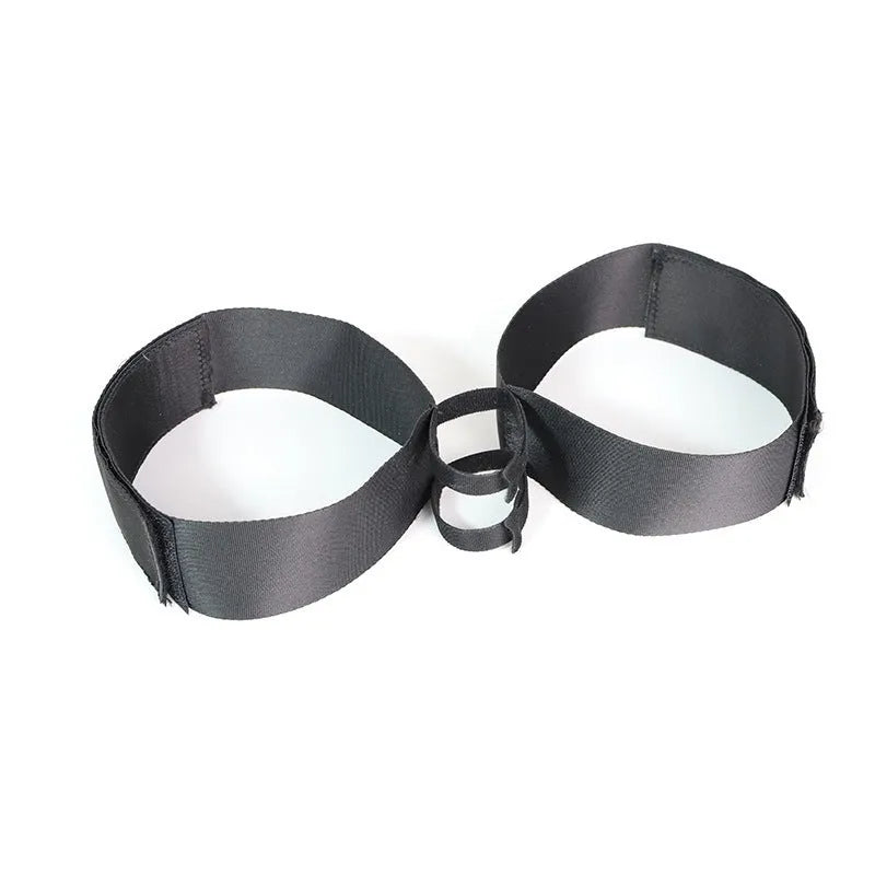Black knitted sex toy strap for women with adjustable belt and included appliance strap