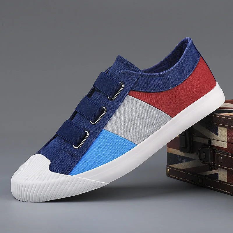 Men's canvas sneakers in multiple colours with elastic band closure and vulcanised rubber soles