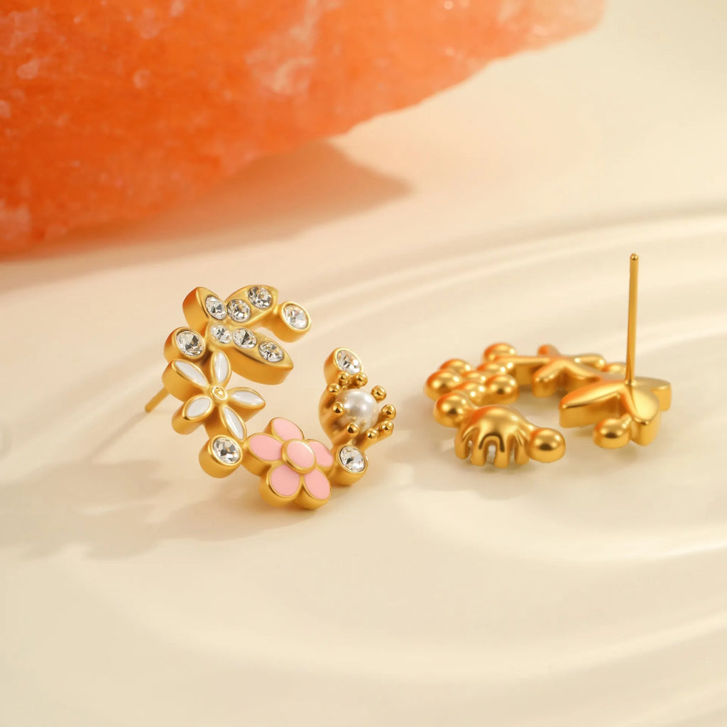 Flower-shaped stud earrings with colourful oil accents and petal elements on 18K gold electroplated stainless steel