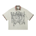 Men's loose blue cotton top with graffiti print and asymmetric streetwear design