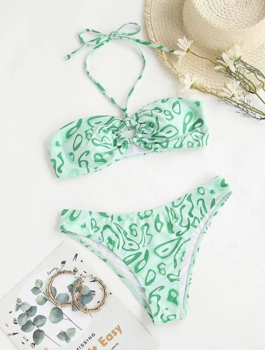 Women's floral bandeau bikini swimsuit set in blue colour with split design