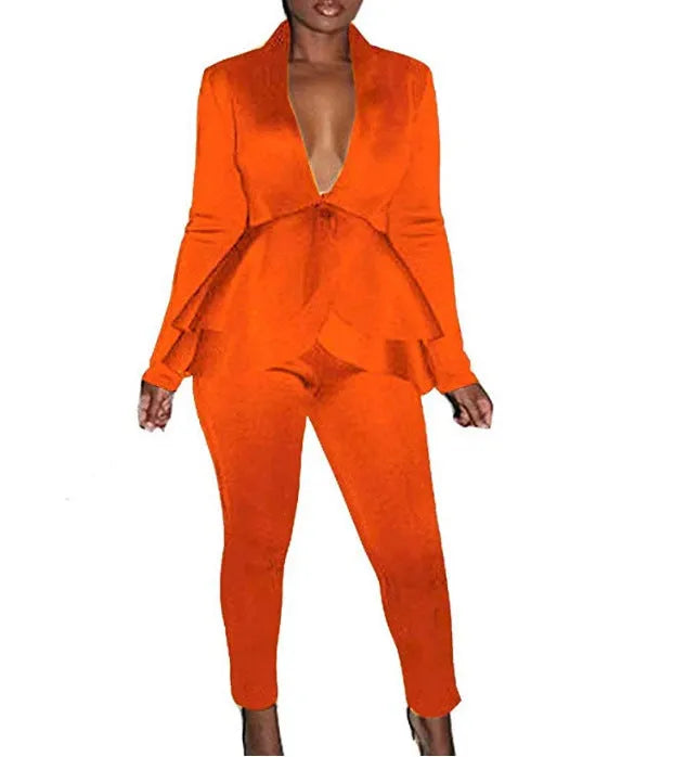 Women's white polyester business casual uniform set with ruffle blouse and pencil pants on a hanger.