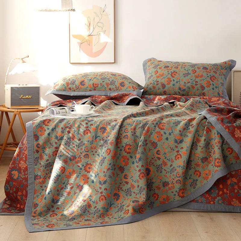 Cotton gauze bed blanket set with floral botanical pattern and two matching pillowcases