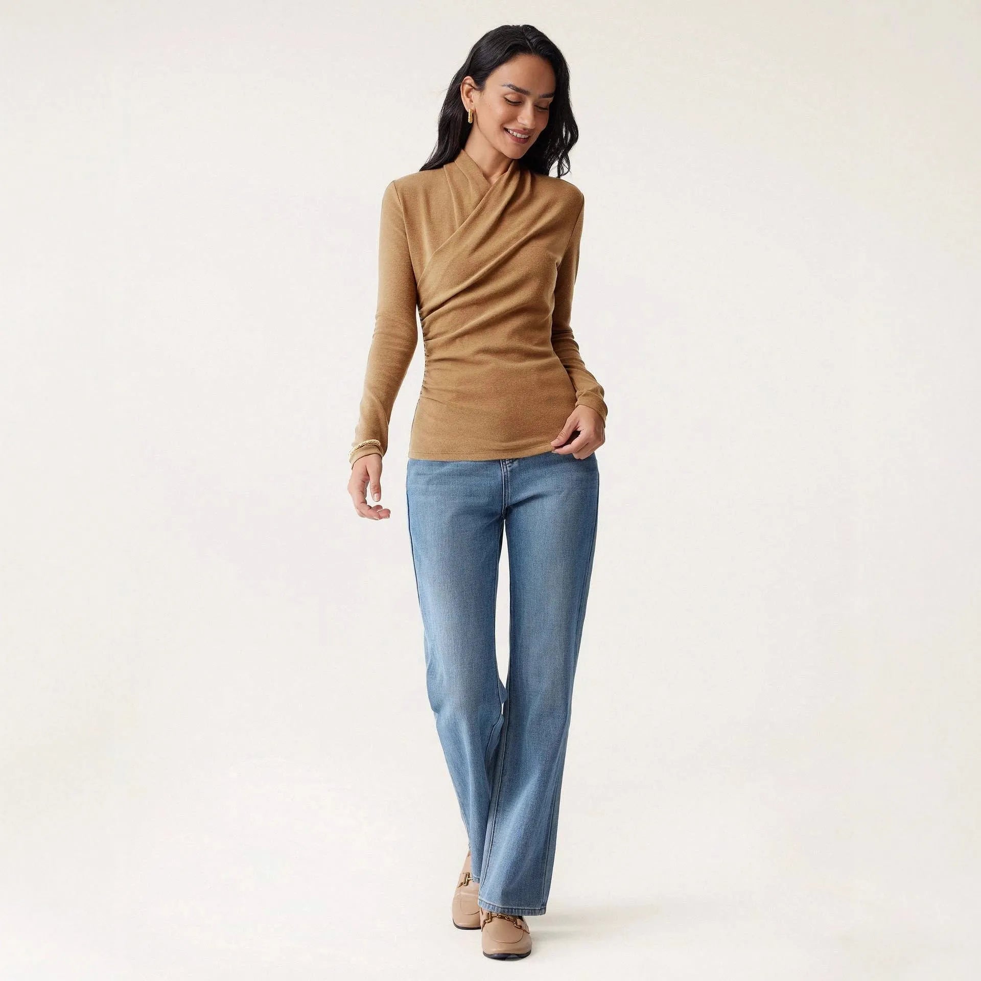 Women's slim fit camel pullover sweater with long sleeves on hanger