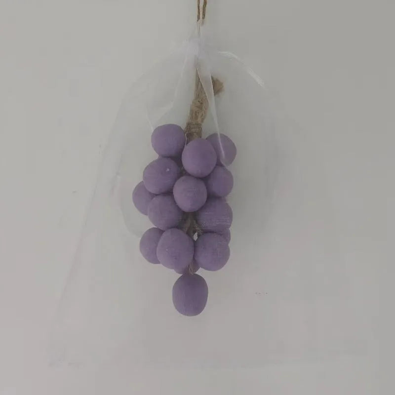 Handmade grape soap bars in black, green, and purple grape scents alongside litchi soap, with gift box and mesh bag packaging