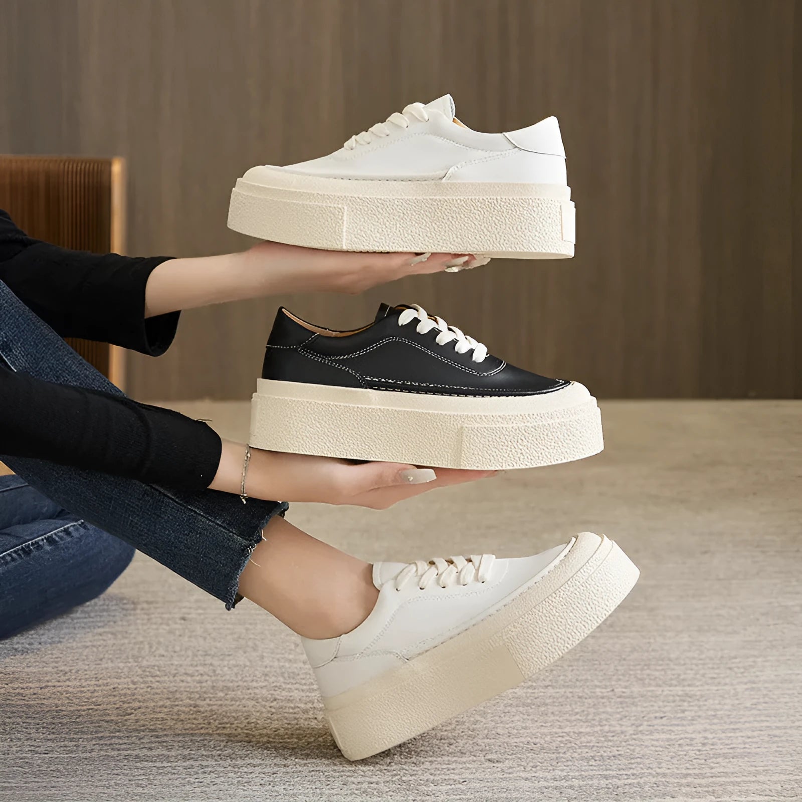 Women's black and white platform casual sports shoes with cowhide leather upper and round toe.