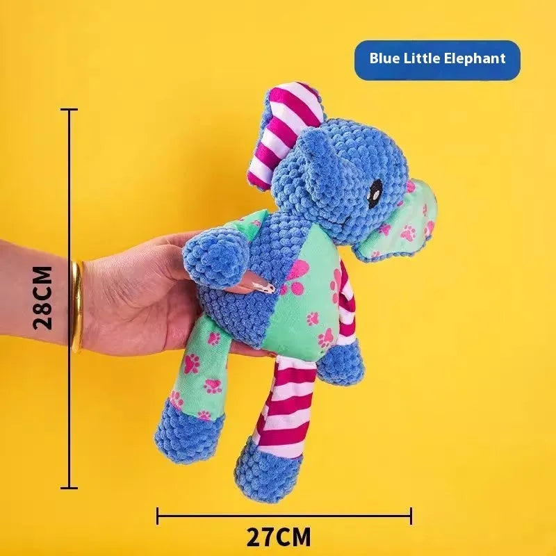 Assorted plush pet chew toys including a blue elephant, a duck, and a donkey in different colours