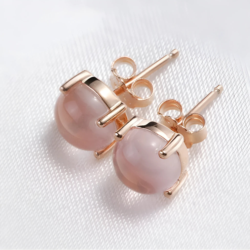 Women's rose gold drop stud earrings with synthetic quartz crystal inlay, Korean minimal style.