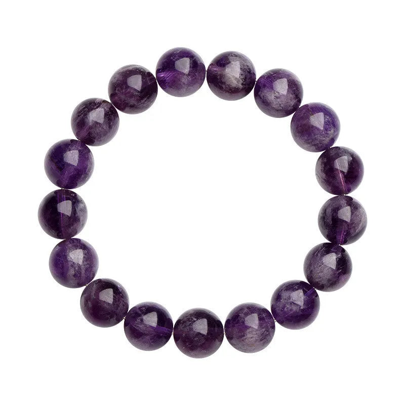 Natural feather amethyst crystal bracelet with geometric shape and silver fastener on wrist.