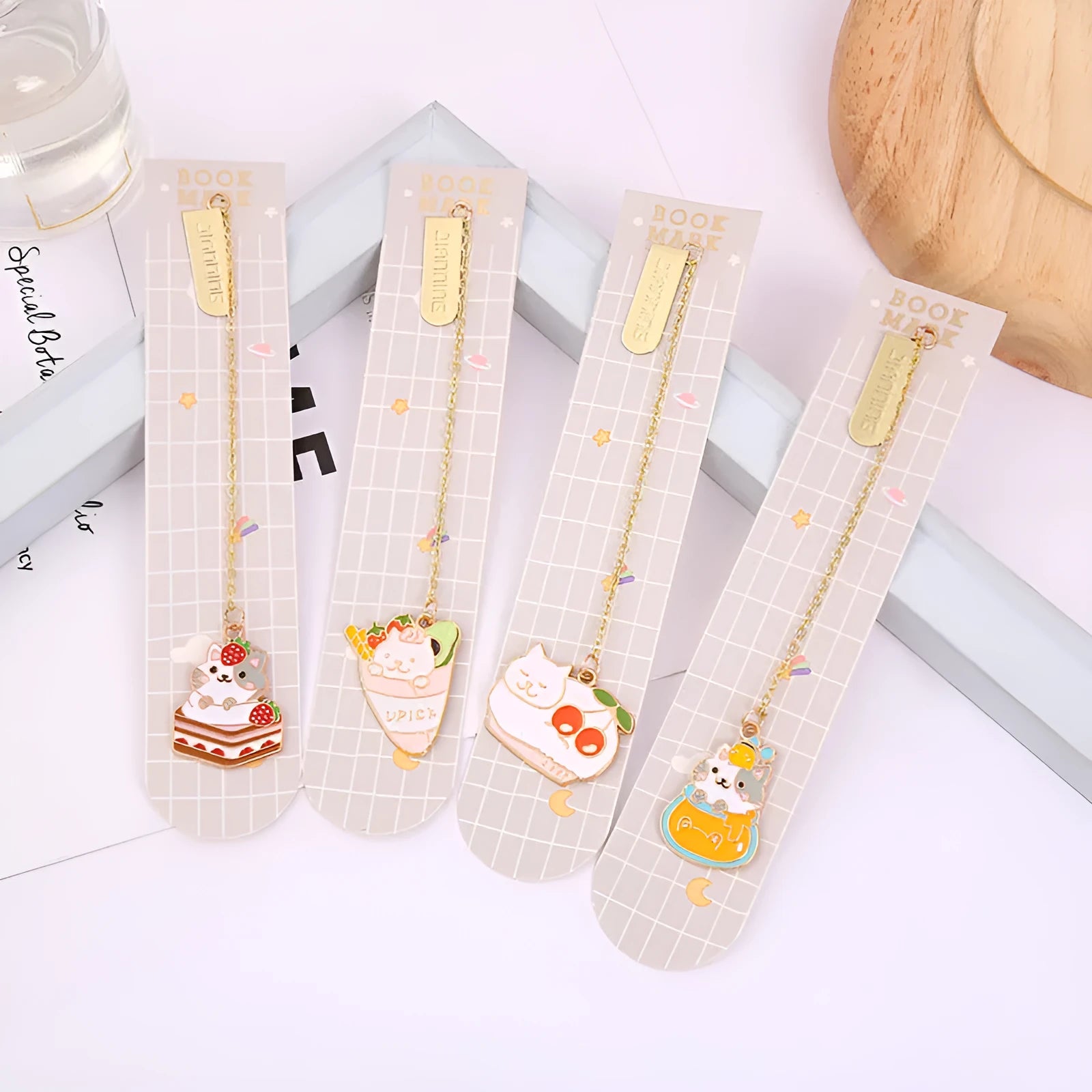 Metal pendant bookmark with cartoon cat design measuring 3.8cm by 18.3cm
