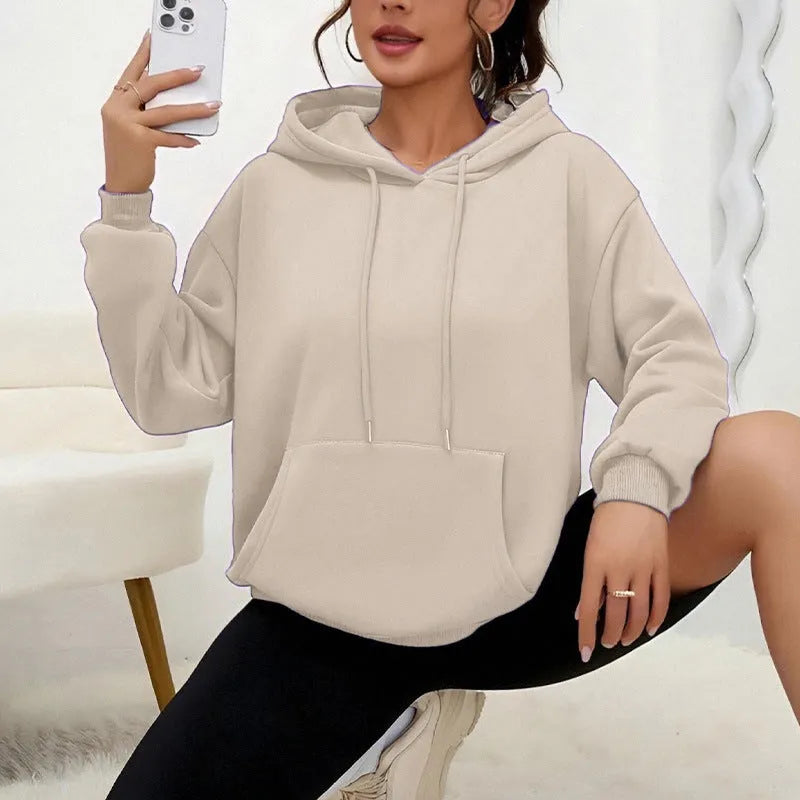 Women's loose fit gray sweatshirt with drawstring waist and front pockets, long sleeve casual top
