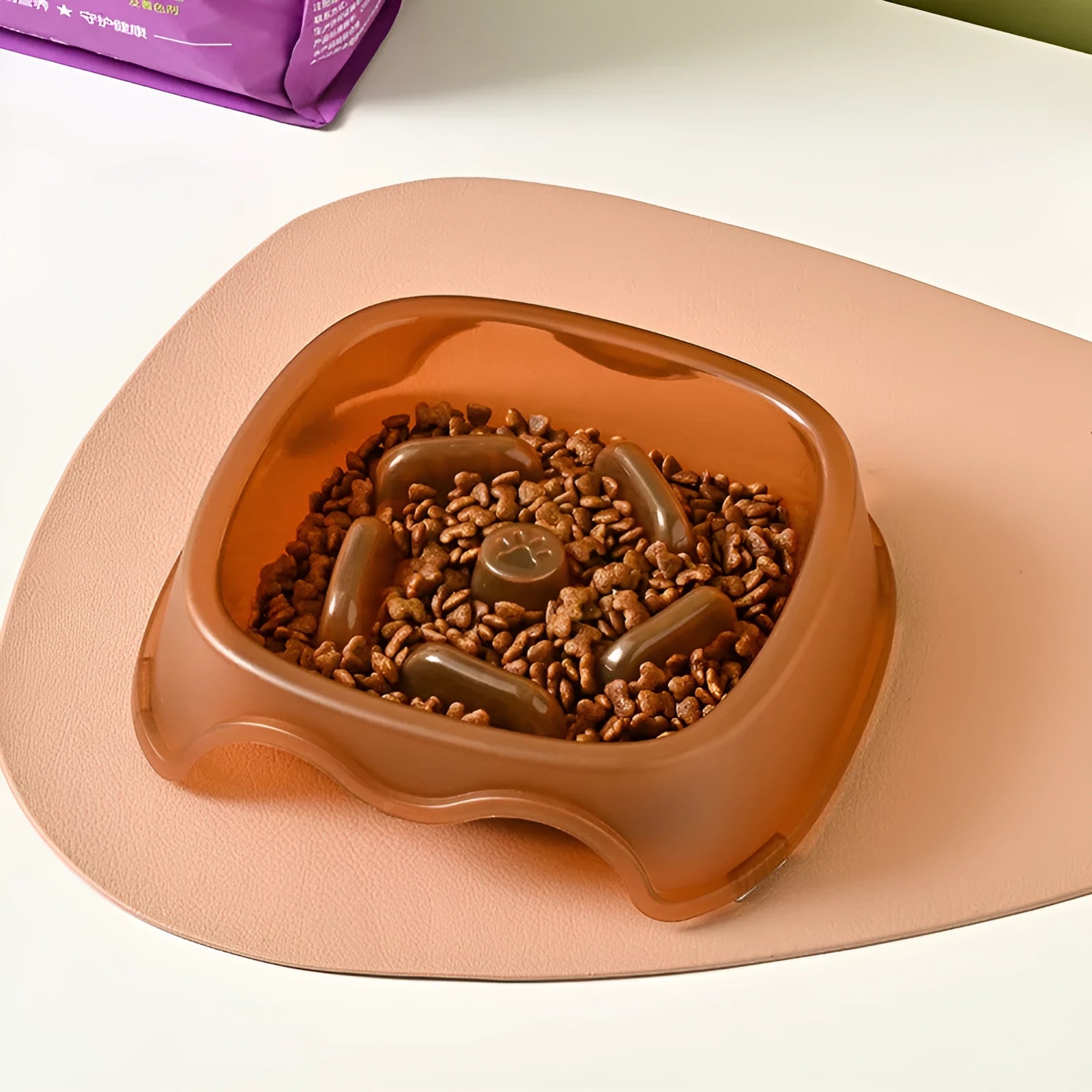 Plastic slow feeder dog bowl in blue, grey, green, and orange colour options