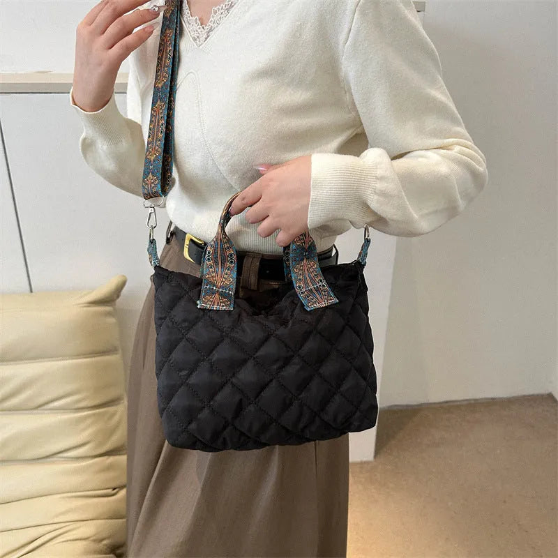 Soft Oxford cloth messenger bag with embroidery details and internal phone pocket in horizontal square shape