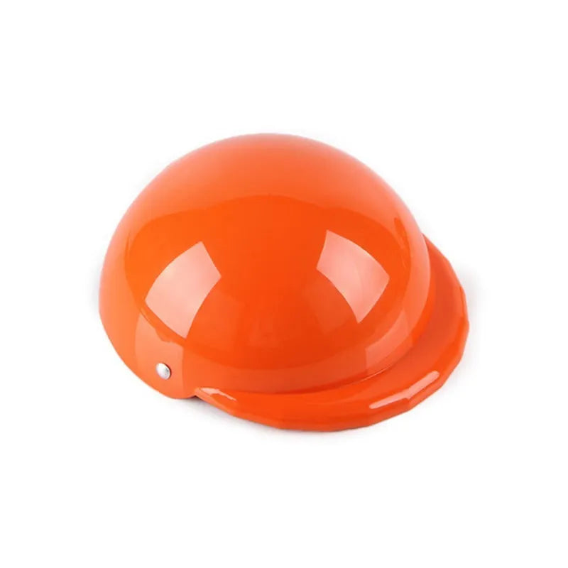 A pink plastic motorcycle cap helmet for a dog, shown alongside white, black, and yellow colour options.