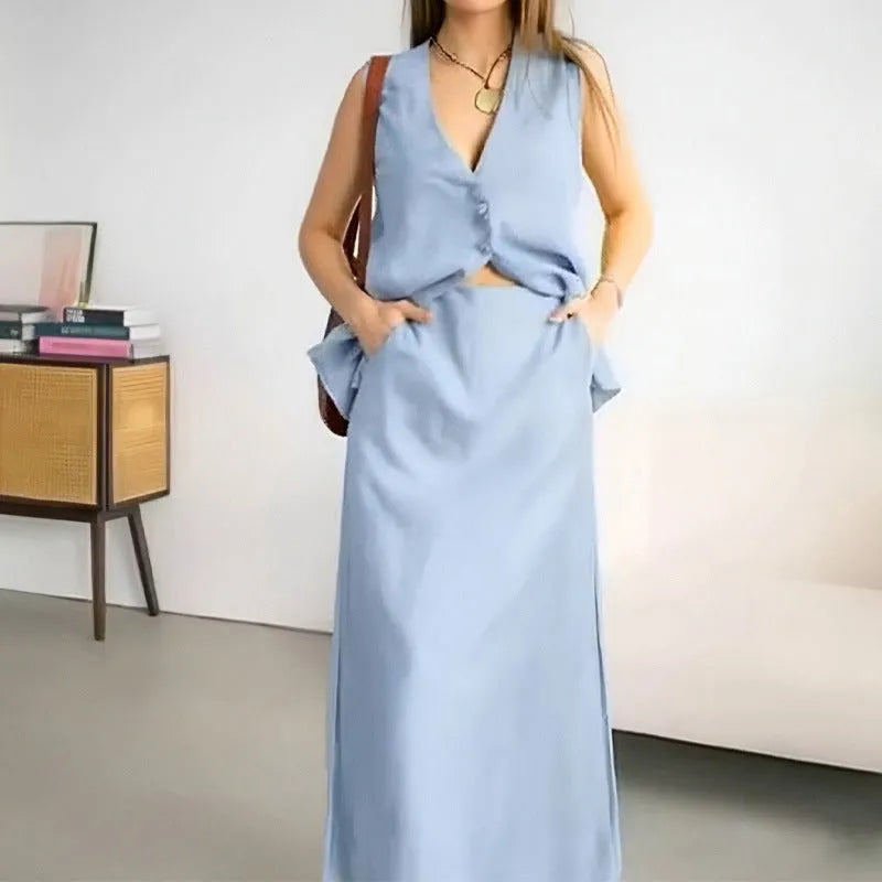 Women's casual two-piece suit with sleeveless top and long skirt in polyester fabric