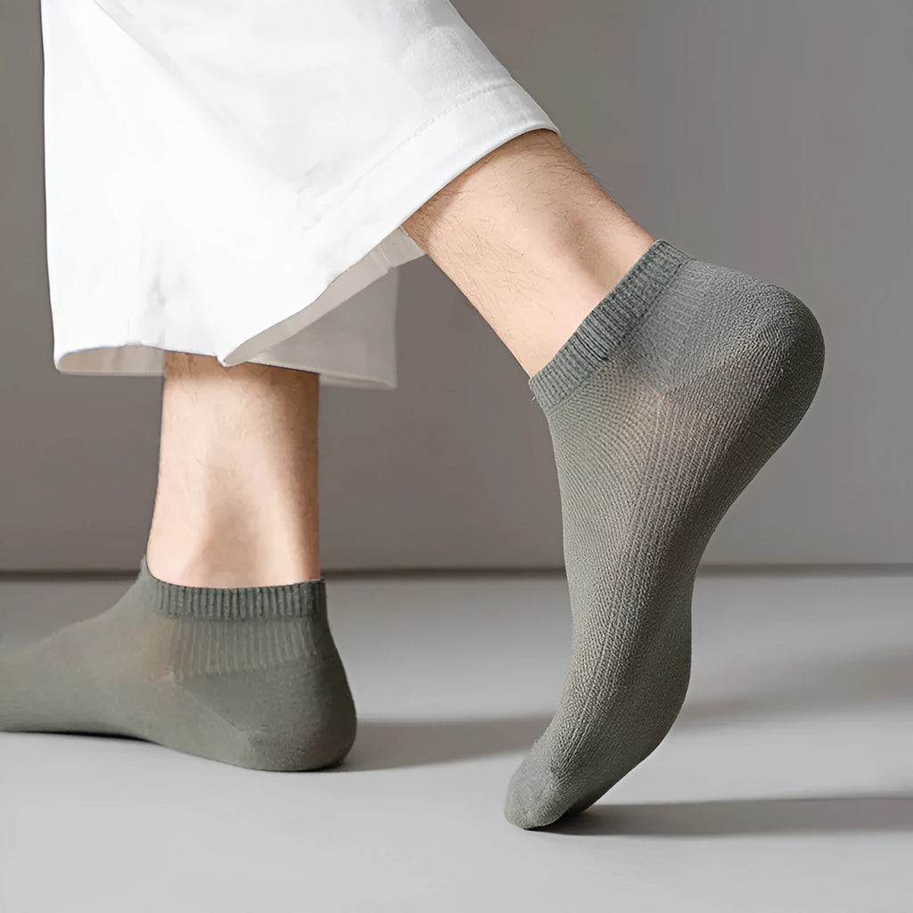 Solid colour low-cut polyester boat socks for men, shown in one of six available colour variants.