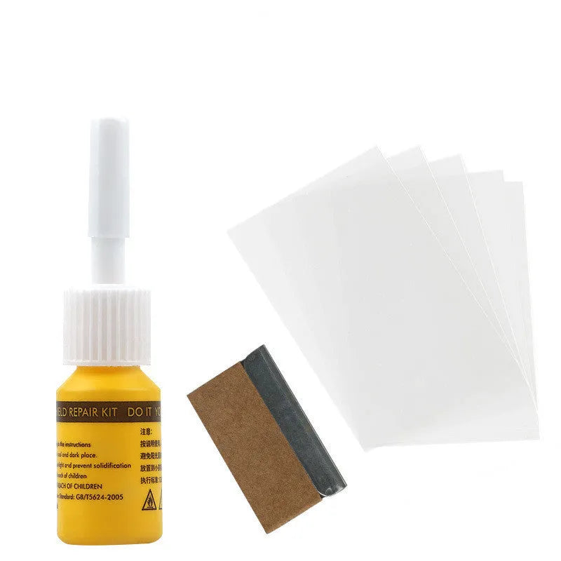 Yellow three-piece car windshield repair agent tool set with applicator and curing tools.
