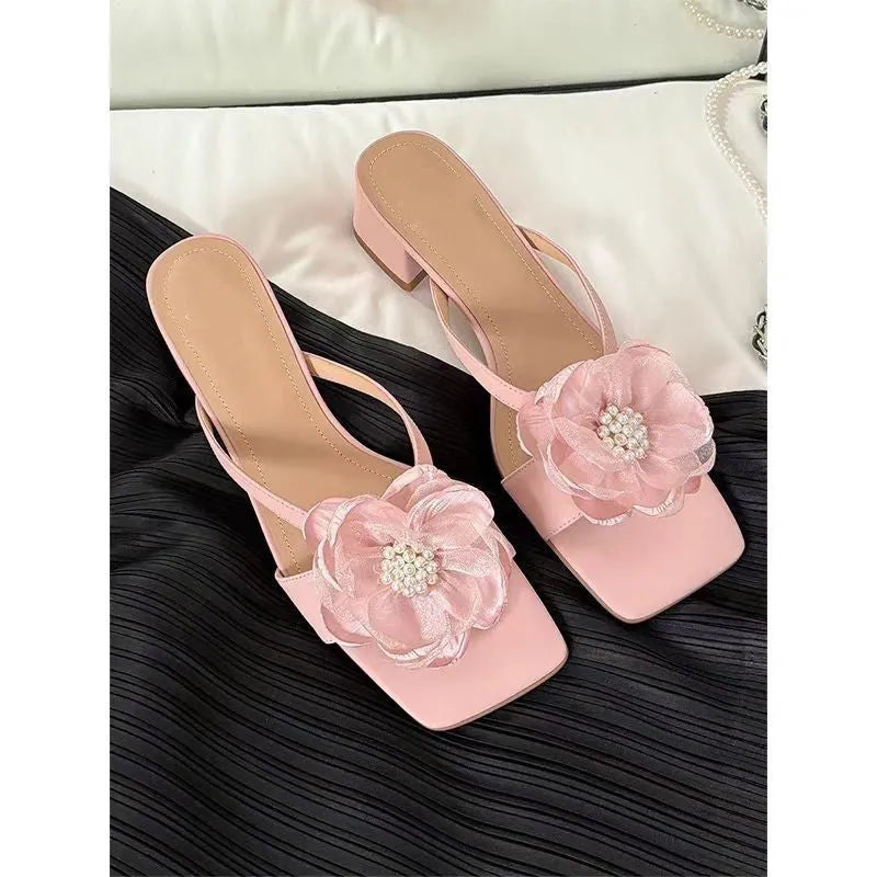 Women's chunky heel square toe sandals with satin upper and flower detail in cream-white