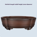 Classical purple clay ceramic bonsai pot with old pile finish, shown on a tabletop.