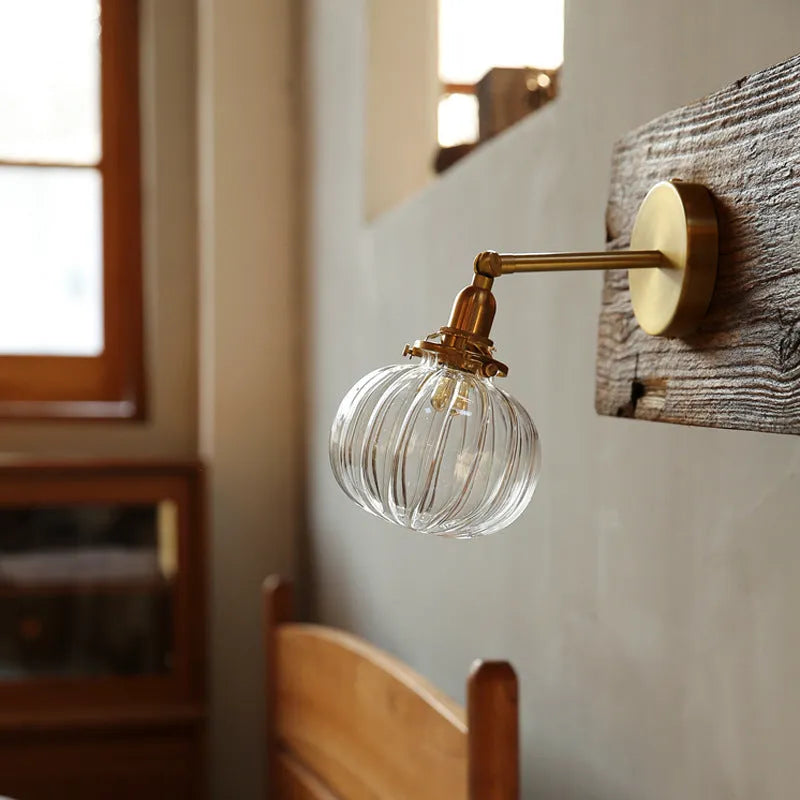 Pumpkin-shaped transparent glass wall lamp for living room or bedroom lighting