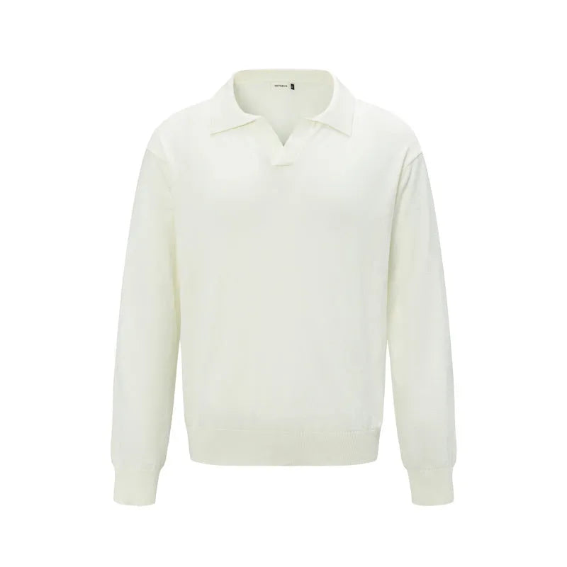 Man wearing a loose black acrylic blend pullover bottoming shirt for casual leisure wear.
