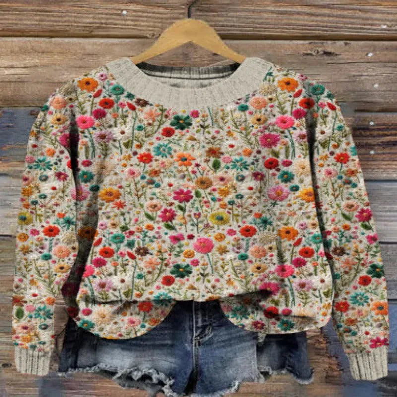 Little Flower digital printed round neck sweater in polyester, shown on a hanger.