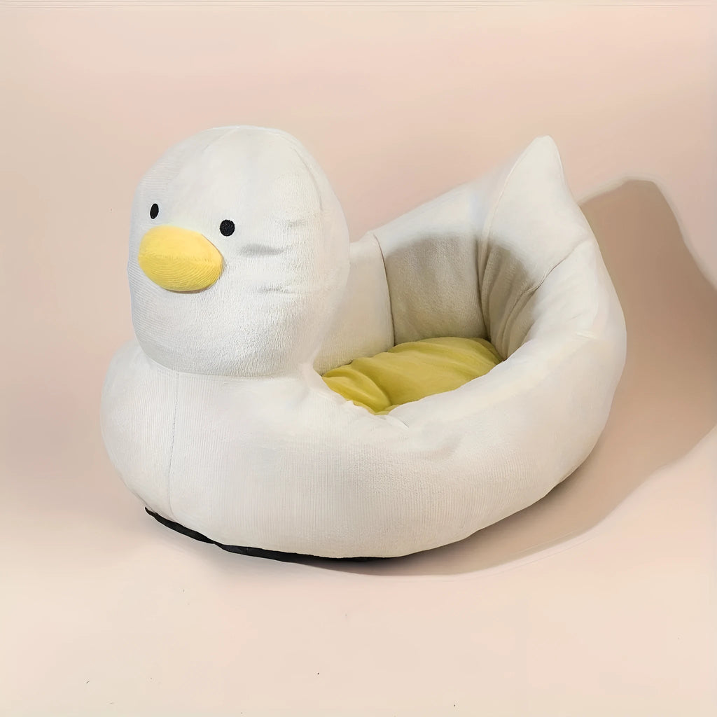 Blue duck-shaped pet bed sofa for small dogs and cats on white background