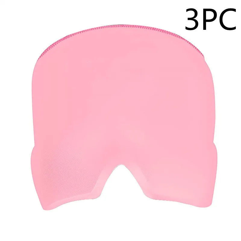 Black elastic cloth gel cold therapy eye mask for headache relief on grey background.
