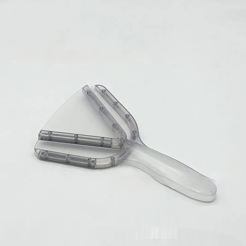 Red adjustable telescopic can opener and bottle opener with non-slip handle on a kitchen counter.