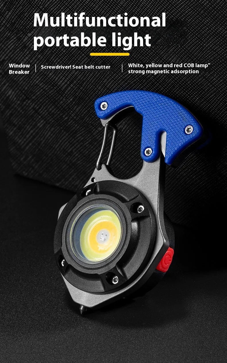 Compact multifunctional keychain torch showing COB light array, keyring, and built-in window breaker and screwdriver tools.