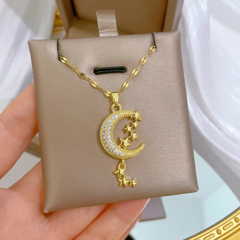 Moon pendant necklace with diamond accents on copper with geometric stainless steel chain