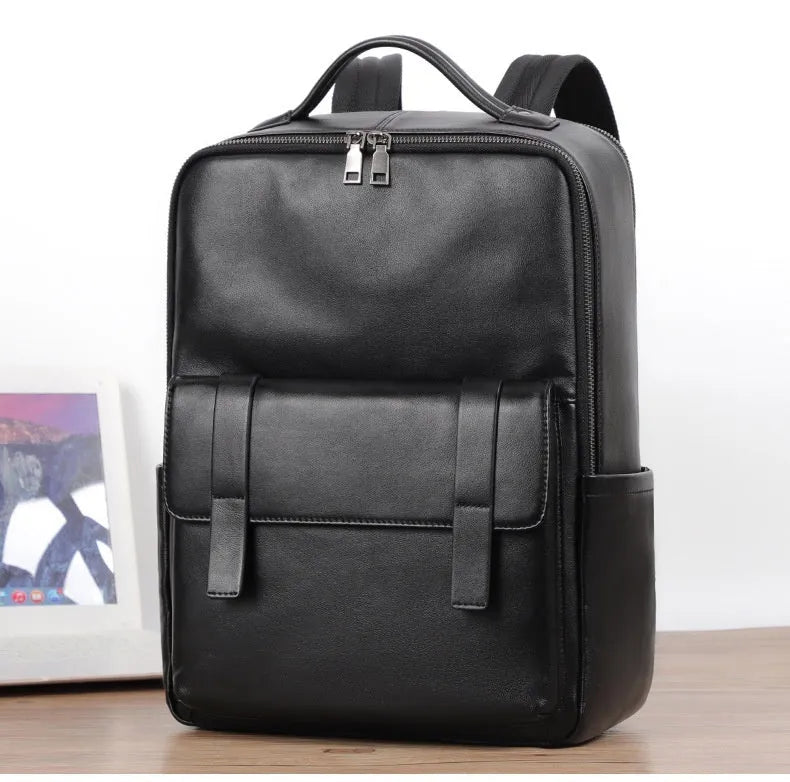 Men's large capacity leather computer backpack in black with woven detailing