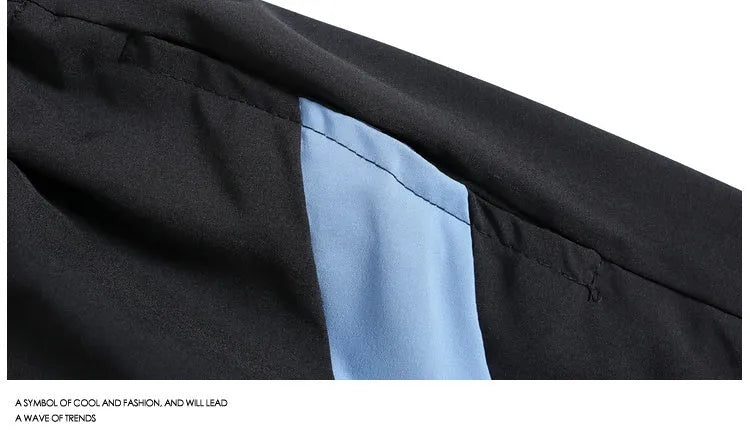 Black loose-fit sports shorts with elastic waistband and above-knee length for training