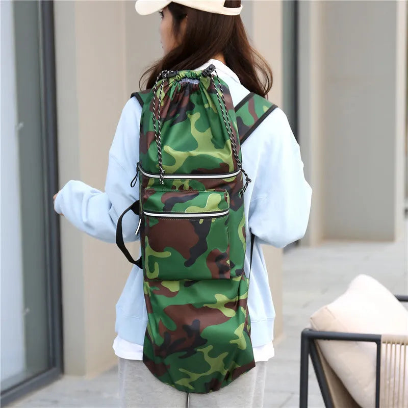 Waterproof nylon skateboard backpack in camouflage, showing large capacity for fishing rods and sports gear.