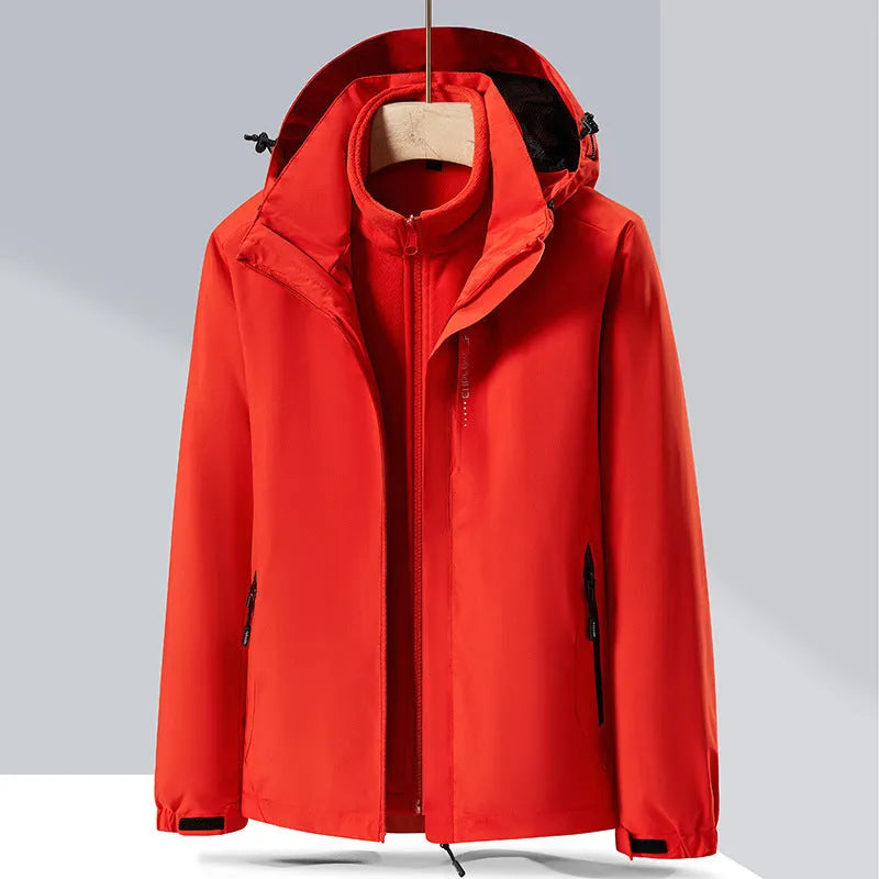 Men's black waterproof mountaineering jacket and trousers set with removable fleece lining.