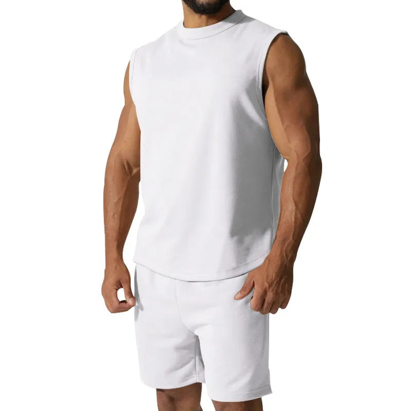 Men's sleeveless cotton blend sports top and matching shorts in a solid colour