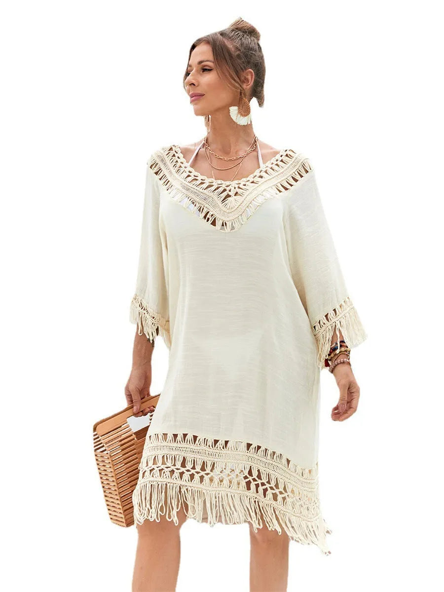 Apricot hand-crocheted women's beach dress with polyester lining shown as beach cover-up