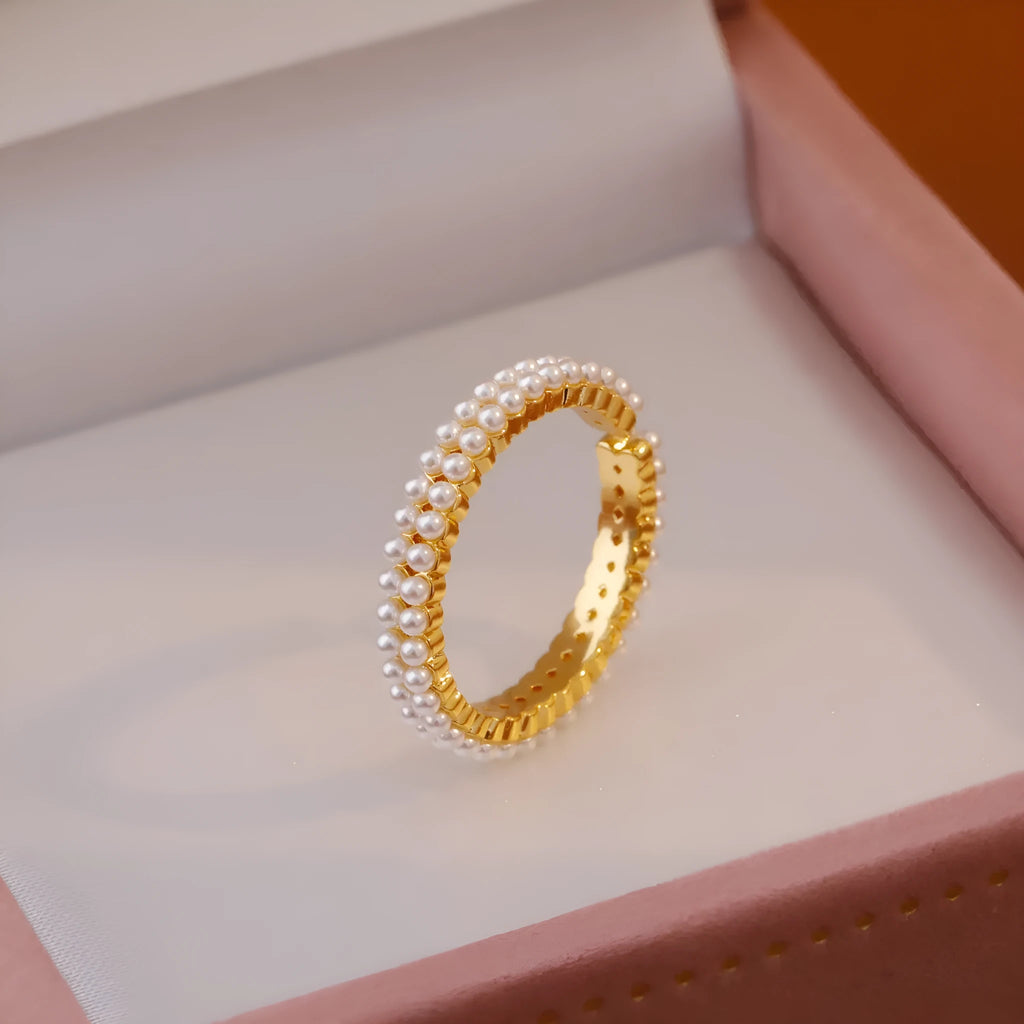 Gold geometric open-mouth women's ring with circular design elements on copper with electroplated finish