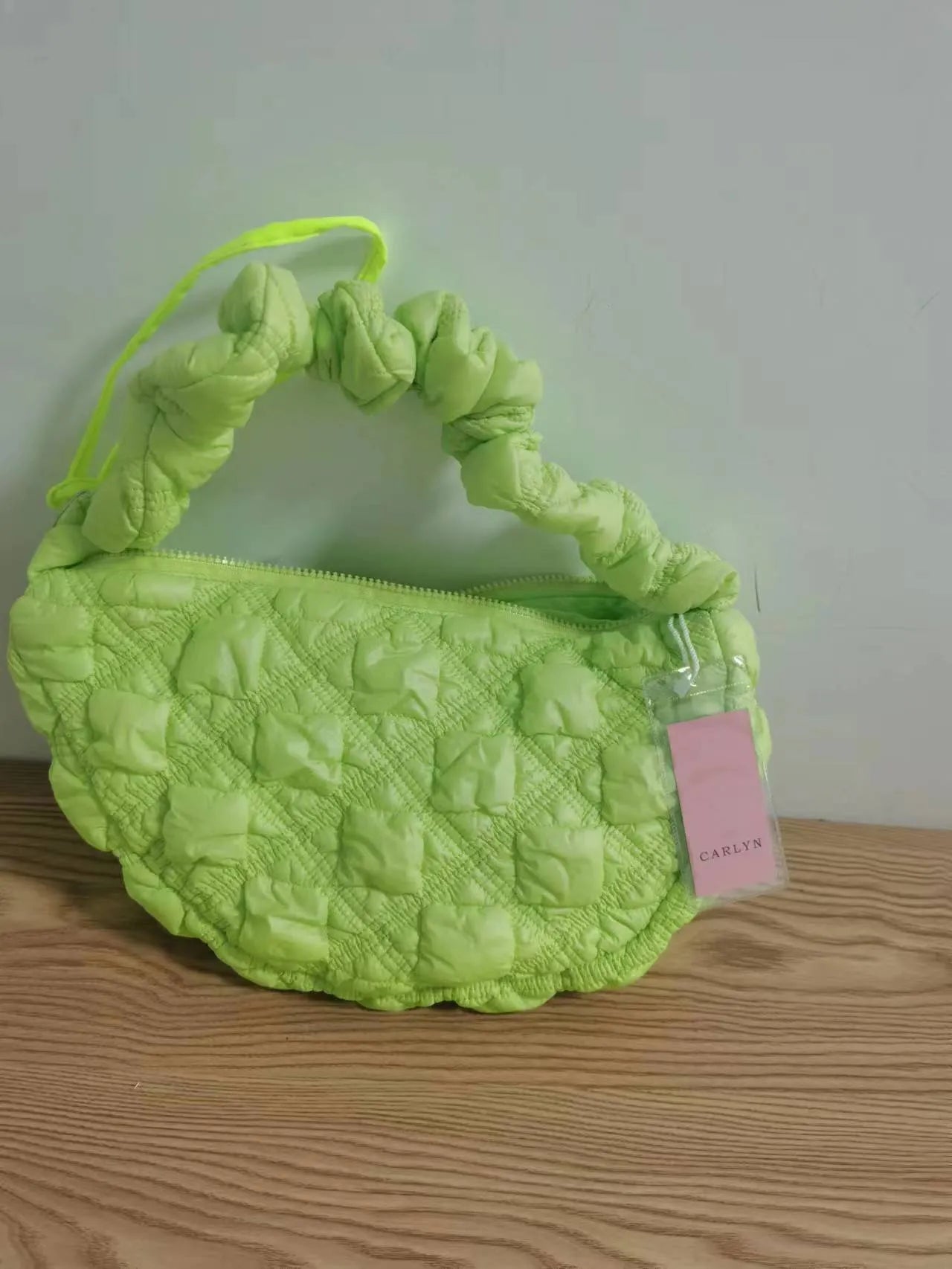 Women's nylon shoulder messenger bag in beige colour with adjustable strap