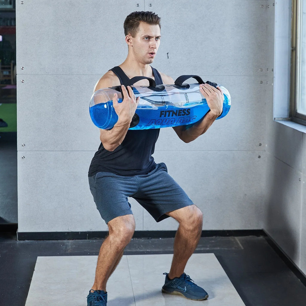 Transparent inflatable PVC bag filled with water, serving as an adjustable weight for strength training.
