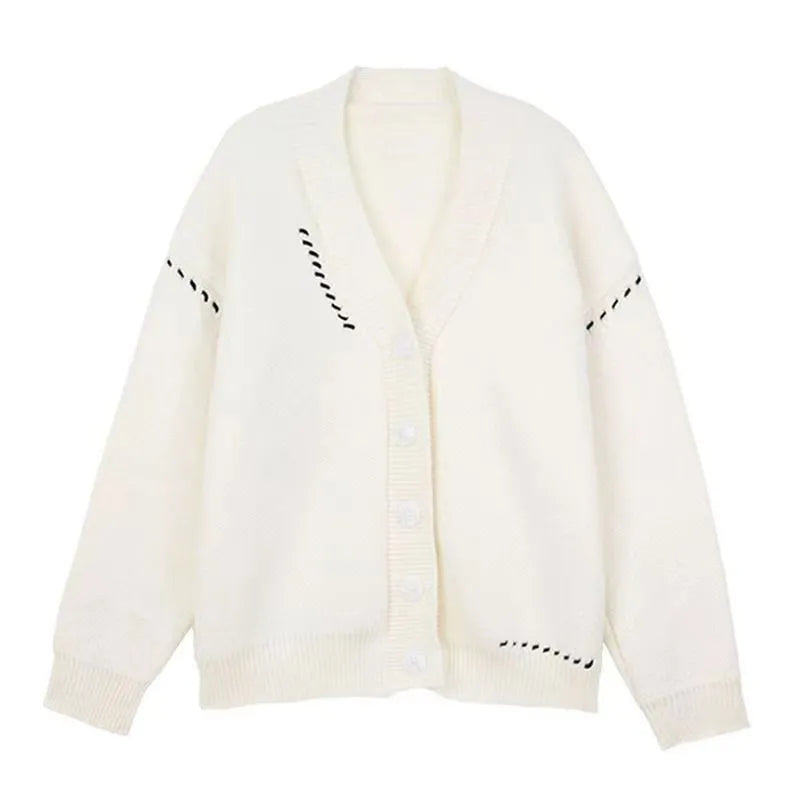 Women's loose fit knitted cardigan coat in black or white with long sleeves