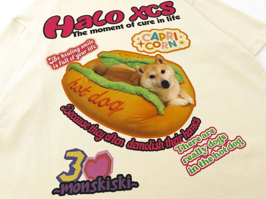 Loose fit white cotton T-shirt with a cartoon hamburger dog print on the front.