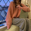 Women's loose polyester pullover sweater in lake blue, shown with regular sleeves and solid colour design.