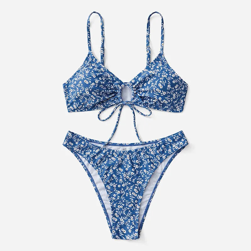 Blue three-piece polyester swimsuit set with top and shorts on a mannequin.